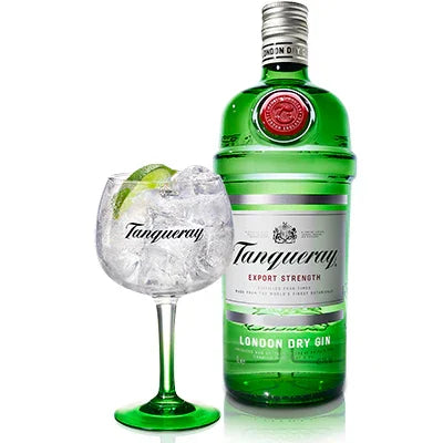 Tanqueray London Dry Gin bottle next to a gin and tonic with ice and lime