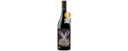 Red wine bottle with kangaroo label, award medals, on white background
