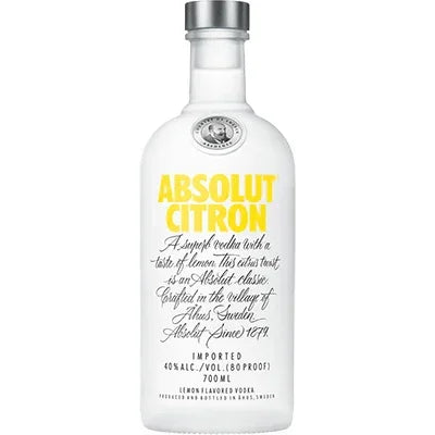 Absolut Citron vodka bottle with yellow label, lemon flavored, 700ml, clear glass
