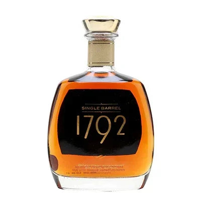 1792 Single Barrel whiskey bottle with gold cap and amber liquid on white background
