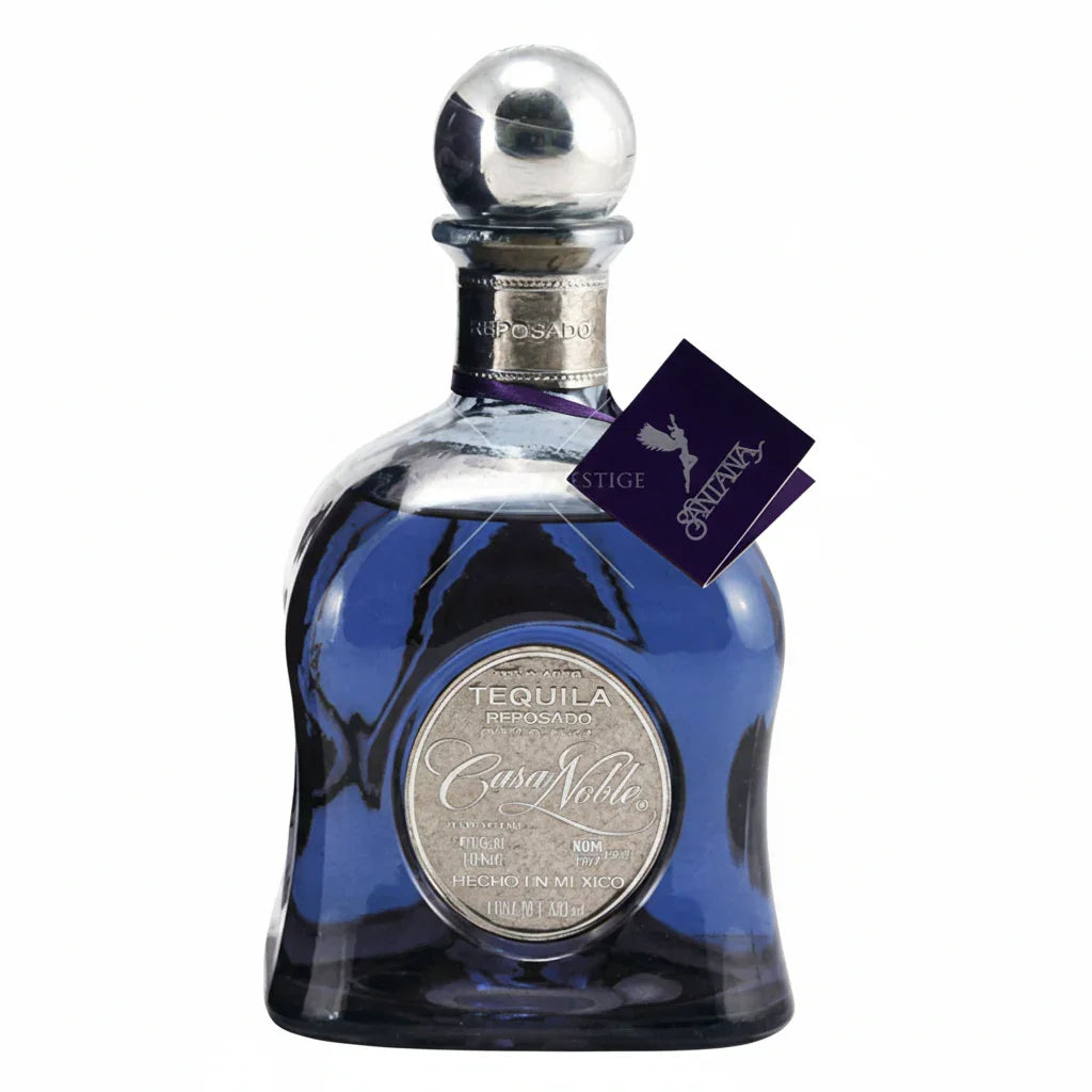 Casa Noble Reposado tequila bottle with silver label and distinctive blue glass