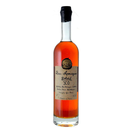 Bas-Armagnac XO bottle with amber liquor and gold label on white background