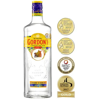 Gordon's London Dry Gin bottle with award medals, spirits, liquor, clear glass, yellow label
