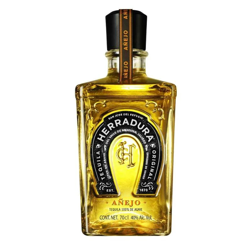 Herradura Anejo Tequila 700ml bottle with gold liquid and black label on white background