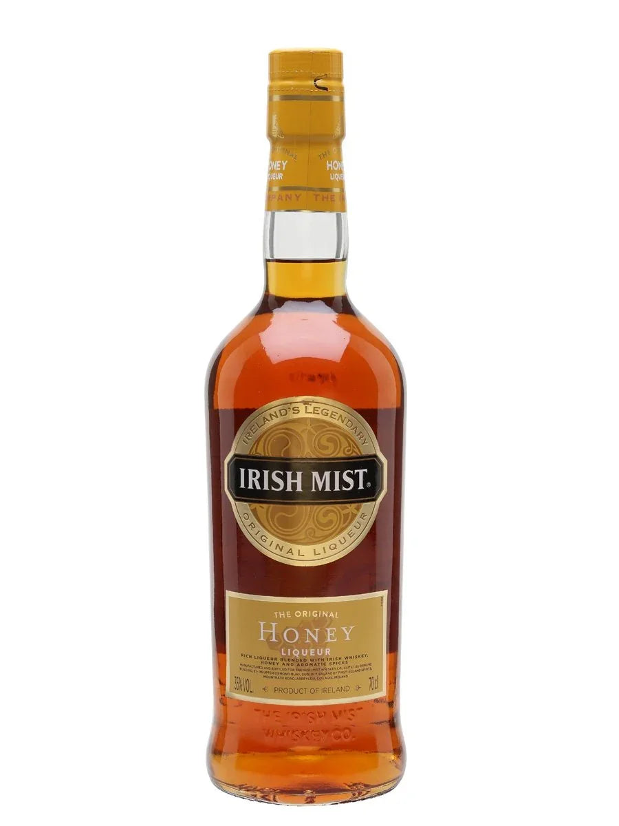 Irish Mist honey liqueur bottle with gold label and amber liquid on white background