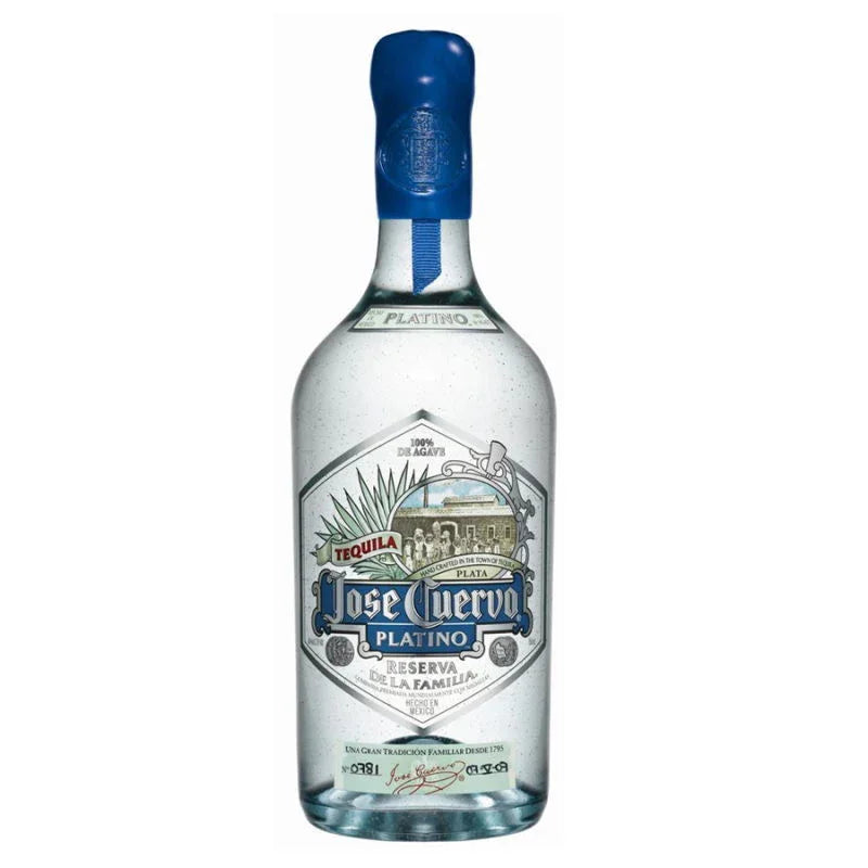 Clear glass bottle of premium silver tequila with blue wax seal and decorative label