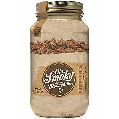 Ole Smoky Tennessee Moonshine Butter Pecan liqueur in a glass jar with pecan accents