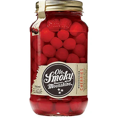 Jar of Ole Smoky Moonshine Cherries with gold lid and visible red cherries in syrup