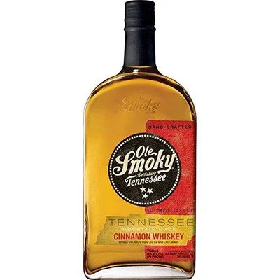 Ole Smoky Tennessee Cinnamon Whiskey bottle with red and black label, amber liquor