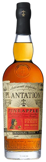 Plantation Pineapple rum bottle with vintage label and amber liquid