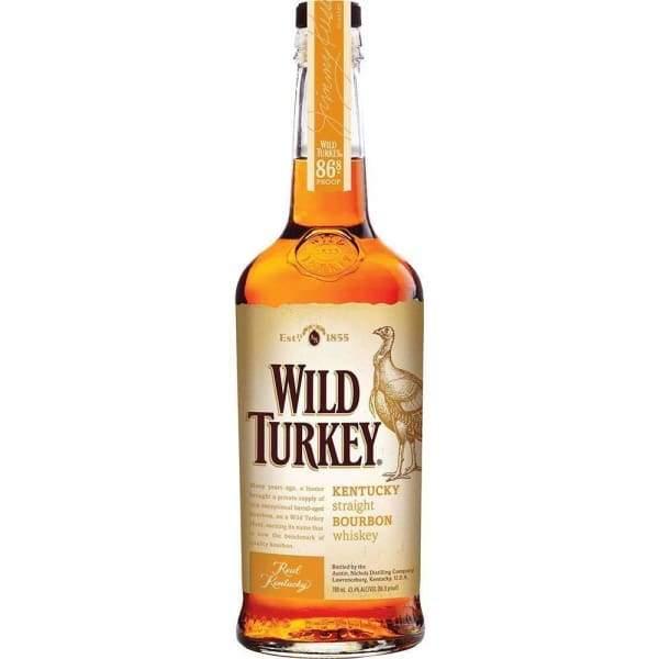 Wild Turkey Kentucky straight bourbon whiskey bottle with gold label on white background