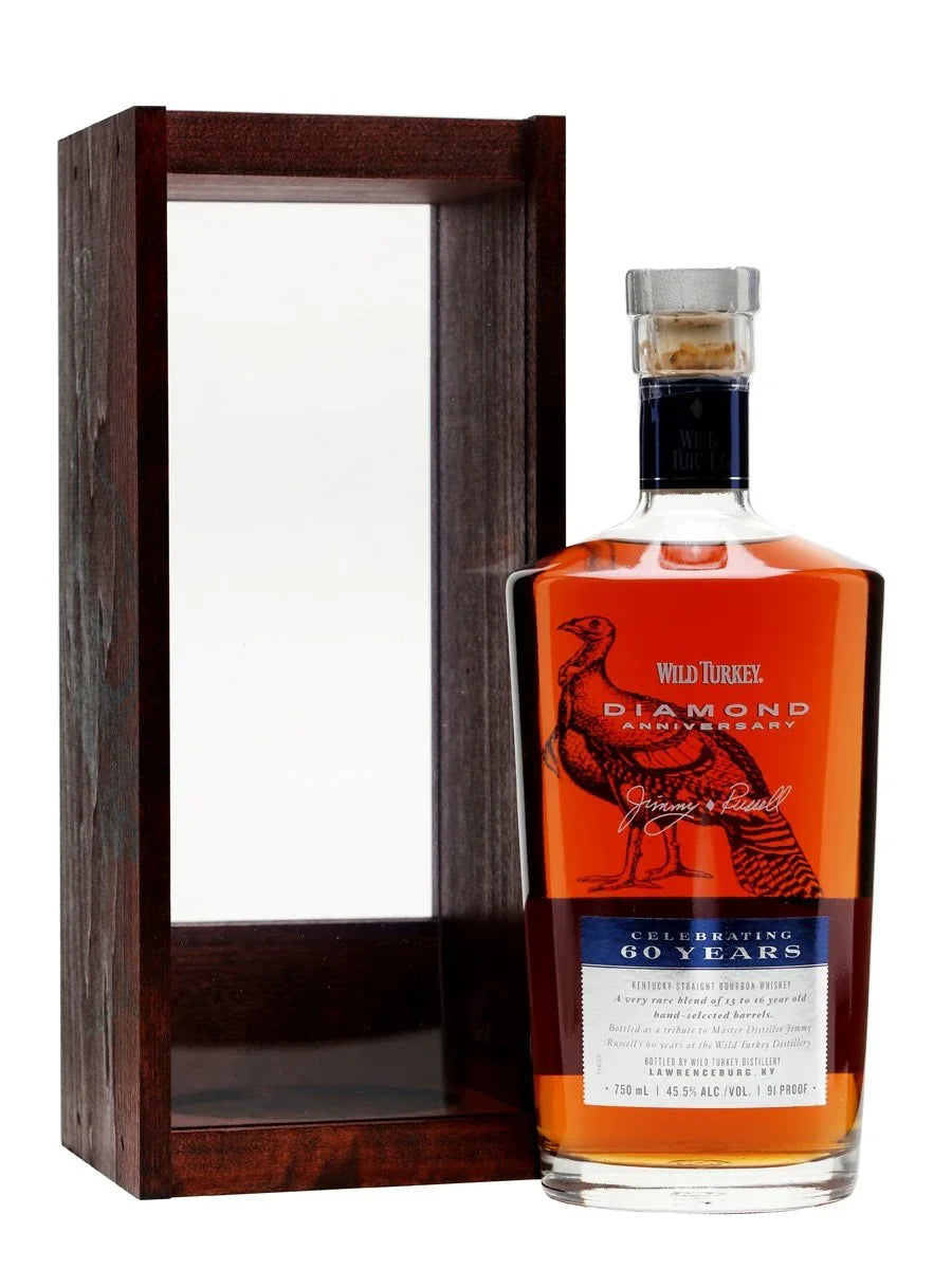 Wild Turkey Diamond Anniversary bourbon whiskey bottle with embossed turkey, gift box beside