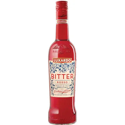 Luxardo Bitter Rosso red liqueur bottle with decorative label on white background