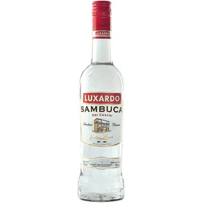 Luxardo Sambuca liqueur bottle with clear liquid and red label on white background